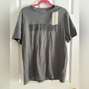 🩵 Calvin Klein Jeans gray logo graphic tee – men’s size Large Bundle 3 for $20
